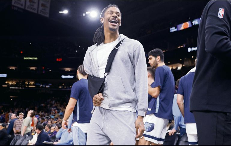 Morant, quien fue suspendido 25 juegos, sólo jugó nueve encuentros esta  campaña. AFP/C. Coduto