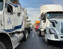 Ayer, afiliados a Transportistas de Carga y Turismo causaron caos en la autopista México-Querétaro, una vialidad que también será tomada día 5 de febrero. SUN/I. Montaño