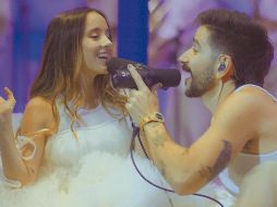 La pareja de cantantes se muestran felices en el video del tema “Plis”. CORTESÍA