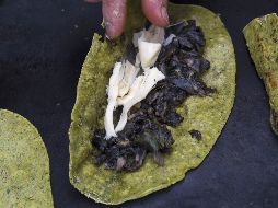 Este icónico producto lácteo puede traerte algunos problemas de salud si lo consumes en grandes cantidades. AFP / ARCHIVO