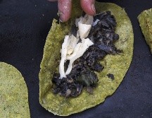 Este icónico producto lácteo puede traerte algunos problemas de salud si lo consumes en grandes cantidades. AFP / ARCHIVO