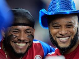 Canó (izquierda) tuvo una destacada carrera en las Grandes Ligas y es parte de la Selección dominicana de beisbol. AP/W. Lee