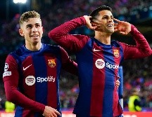Fermín López (izq.) y Joao Cancelo encaminaron el triunfo blaugrana al marcar los primeros dos goles del partido. EFE/S. Wu