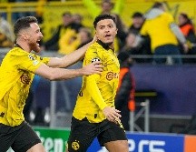 Jadon Sancho (der.) marcó su gol a los tres minutos de juego. AP/M. Meissner