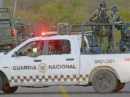 El operativo dejó un elemento de la Guardia Nacional muerto, uno herido y tres presuntos delincuentes detenidos. AFP