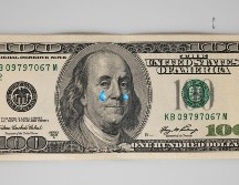 Nuestra moneda se cotiza en los mercados internacionales alrededor de los 16.34 pesos por dólar al mayoreo. ESPECIAL/ Foto de engin akyurt en Unsplash