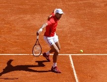 El número uno del mundo llegó a ser exigido en varios momentos de su enfrentamiento ante Alex de Minaur. EFE/S. Nogier