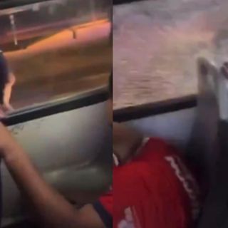 Policía lanza piedra contra camión de aficionados de Chivas (VIDEO)