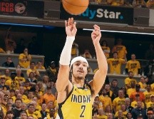 Andrew Nembhard encestó el triple clave para la victoria de los Pacers. AFP/N. Butler