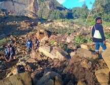 El deslizamiento de tierra azotó la aldea de Yambali. ESPECIAL / AFP