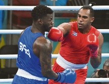 El Comité Olímpico Internacional desconoce a la Federación Internacional de Boxeo y por ello le pone un pero a las primas a las que aspiran los atletas. AFP/P. Vera