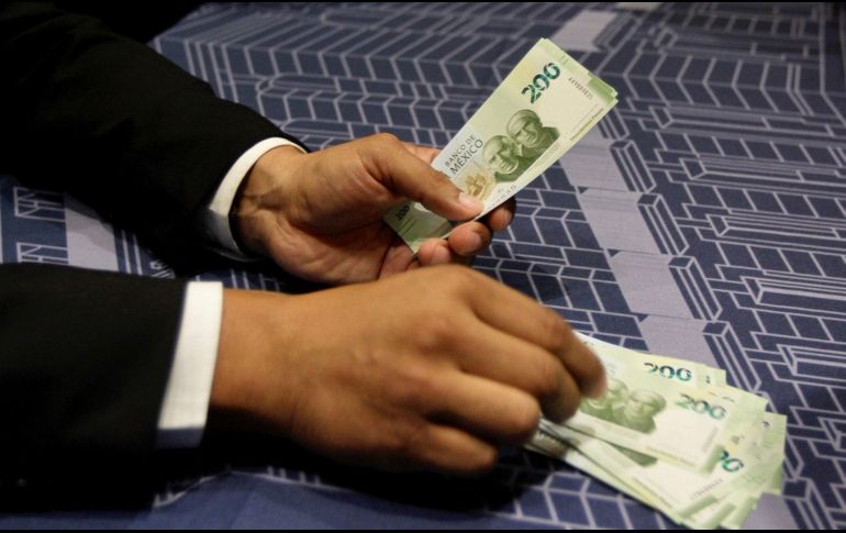 El precio del dólar se alejó un poco tras el anuncio de los nuevos integrantes del próximo gabinete de Claudia Sheinbaum. NOTIMEX / ARCHIVO