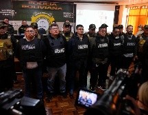 Varios detenidos por su presunta participación en el intento fallido de golpe del día anterior presentados ante la prensa en La Paz, Bolivia. AP /Juan Karita