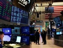 Wall Street terminó este viernes en verde el mes de noviembre, pese a que el índice tecnológico Nasdaq anotó pérdidas mensuales por el temor de los inversores a una burbuja de la Inteligencia Artificial (IA). AFP / ARCHIVO