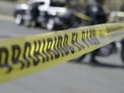 Peritos de criminalística del Instituto de Ciencias Forenses (IJCF) fueron requeridos para procesar el sitio. SUN / ARCHIVO