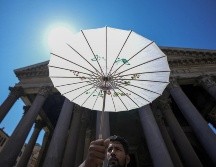 Los meteorólogos dijeron que las temperaturas en las grandes ciudades, fueron aún más altas que lo que se informó oficialmente. AP / A. MEDICHINI