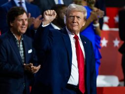 En su camino hacia la tribuna donde lo esperaban su familia y su posible vicepresidente, J.D. Vance, Trump levantó el puño en alto. EFE