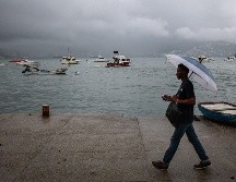 Las lluvias fuertes a intensas podrían ocasionar encharcamientos, inundaciones y deslaves, así como incremento en los niveles de ríos y arroyos. EFE / ARCHIVO