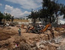 El socavón registrado en la avenida López Mateos, cerca de su cruce con Periférico Sur, provocó el colapso de la vialidad en el sur de la ciudad. EL INFORMADOR / J. Urrutia