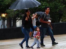 El Servicio Meteorológico Nacional volvió a emitir un aviso este martes en el que pronostica lluvias muy fuertes para siete estados de la República. NTX / ARCHIVO