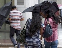 Las lluvias fuertes a muy fuertes podrían ocasionar encharcamientos, inundaciones y deslaves, así como incremento en los niveles de ríos y arroyos. AP / ARCHIVO