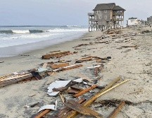 En su proximidad con la Costa Este de Carolina del Norte afectó algunas viviendas. AP