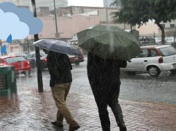 La onda tropical número 18 por el sureste, centro y parte del occidente de la República Mexicana, provocará lluvias. SUN / ARCHIVO