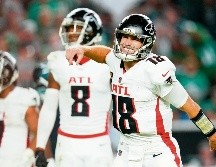 Cousins completó cuatro de cinco pases en la serie ofensiva ganadora. AFP/M. Leff