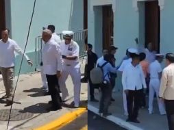 El mandatario ingresaba al lugar acompañado del gobernador Cuitláhuac García, y el secretario de la Marina, José Rafael Ojeda Durán, alcanzó a esquivar la botella que le fue lanzada desde la acera donde los empleados exclamaban consignas 