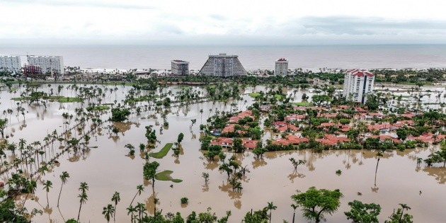 Trail of Destruction: Hurricanes John and Helene Bring Devastating Floods and Loss of Life