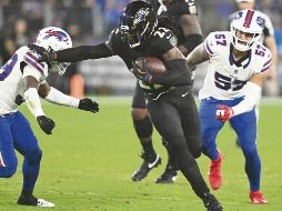 Derrick Henry (#22) se quedó a una yarda de su séptimo juego con 200 o más por tierra. AFP