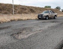 De acuerdo con Claudia Sheinbaum, la inversión del Gobierno federal se dará porque que los baches están entre las principales preocupaciones de la ciudadanía. EL INFORMADOR / ARCHIVO