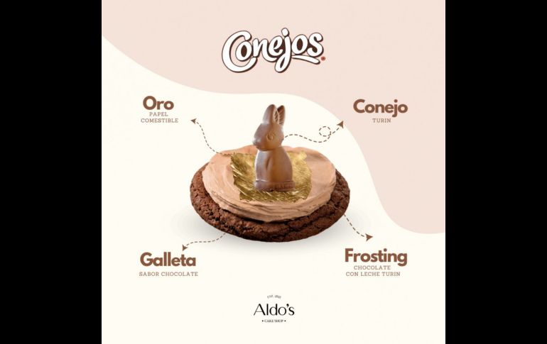 Aldo's: Galleta sabor chocolate con frosting de chocolate Conejos, papel comestible dorado y chocolate Conejos como el detalle perfecto.