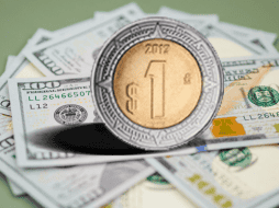 El dólar ha encadenado tres sesiones consecutivas a la baja. Unsplash / CAnva