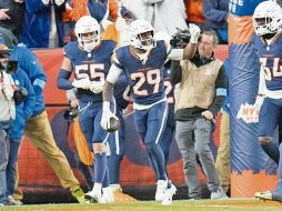 Ja’Quan McMillian (#29) le puso cerrojazo al juego con una intercepción devuelta a las diagonales. AP