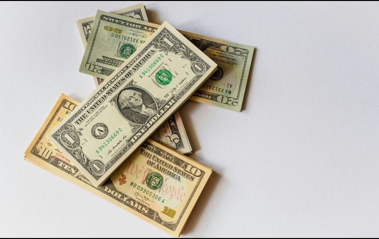 Es relevante mencionar que el precio del dólar ha estado influenciado por la agenda de Donald Trump. Unsplash