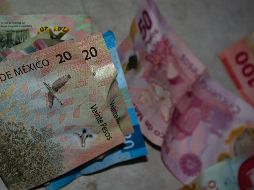 La divisa mexicana concluyó alrededor de 20.32 pesos por dólar, lo que significó una apreciación de 6 centavos. Unsplash