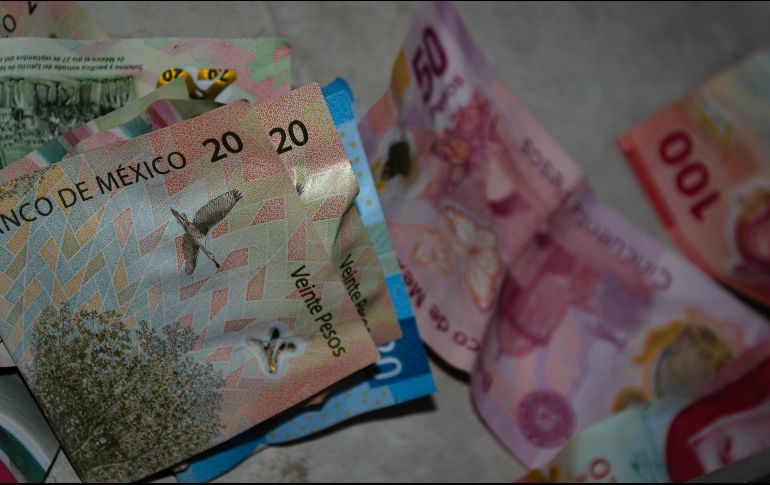 La divisa mexicana concluyó alrededor de 20.32 pesos por dólar, lo que significó una apreciación de 6 centavos. Unsplash