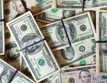 El peso mexicano cotiza en los mercados internacionales alrededor de los 20.10 pesos por dólar. ESPECIAL/ Imagen de bearfotos en Freepik