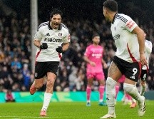 El mexicano Raúl Jiménez disparó al ángulo superior para llegar a un total de 55 tantos en Inglaterra y sentenciar la repartición de puntos. AP / A. Matthews