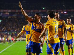 Jesús Garza festeja la segunda anotación de los Tigres. IMAGO7