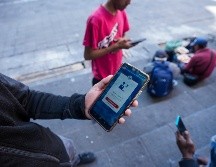 A prácticamente unos metros de Estados Unidos y con rostros de preocupación y tristeza, el grupo de migrantes analizaba qué hará tras está decisión migratoria del nuevo gobierno encabezado por el presidente Donald Trump. AP / F. LLANO