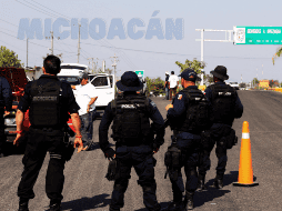 En distintas localidades de la periferia de la cabecera municipal de Apatzingán, la organización criminal atacó a tiros y también con explosivos. AFP / ARCHIVO