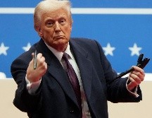 El presidente Donald Trump firmó el sábado una orden para imponer aranceles estrictos a las importaciones de México, Canadá y China. AP/M. Rourke.