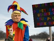 Manifestantes expresan su repudio a la política de Trump respecto a Ucrania. AFP/M. Ngan