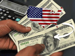 El año pasado México captó 64 mil 745 millones de dólares por remesas, de los cuales 62 mil 529 provinieron de Estados Unidos, es decir, el 96.6% del total. AFP / ARCHIVO