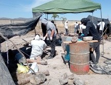 Fiscalía del Estado afirmó que los trabajos de inspección avanzan, localizando hasta ahora diversos restos óseos calcinados.  ESPECIAL/ Guerreros Buscadores de Jalisco