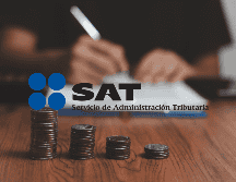 Mantener una salud financiera sólida no solo implica pagar tarjetas de crédito o préstamos a tiempo, sino también estar al día con tus obligaciones fiscales. ESPECIAL / CANVA / Khunkorn