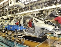 Armadora de automotores. Nuestro país espera alcanzar un mejor acuerdo con la Unión Americana. AFP/Archivo