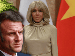 En el video se muestra cómo la primera dama francesa dirige ambas manos contra el rostro de su marido cuando recién se abría la puerta del avión. EFE/C. Thirasupa EFE/N. Nguyen